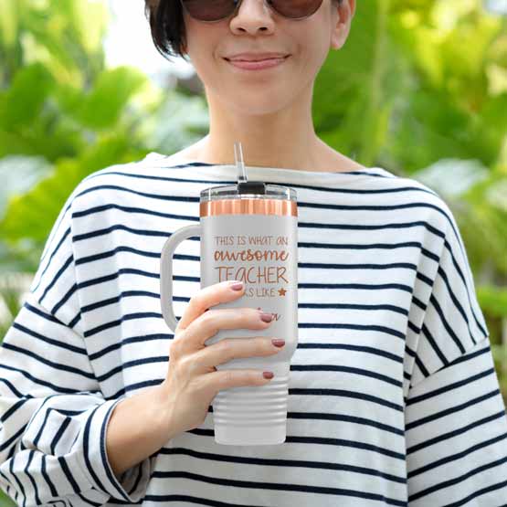 Happy Woman Outdoors Holding White And Rose Gold Stainless Steel Coffee Tumbler With Handle And Straw And Teacher Message