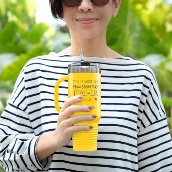 Happy Woman Outdoors Holding Yellow Gold Stainless Steel Coffee Tumbler With Handle And Straw And Teacher Message
