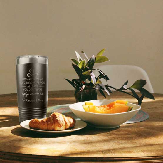 Black Stainless Steel Coffee Tumbler Engraved With Funny You Don’t Have Ugly Children Message For Dad On Table With Food