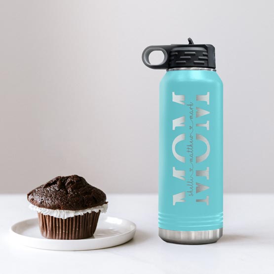 Custom 32 Ounce Teal Water Bottle Engraved With Custom Children Names Inside Mom Text On White Table Beside Chocolate Cupcake