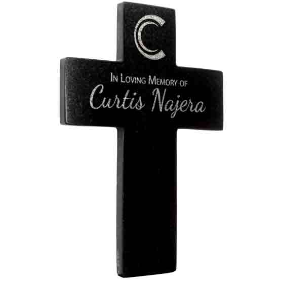 Custom Cross Shaped Granite Memorial Headstone Laser Engraved With Monogram And Name Against White Background