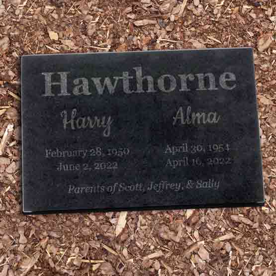 Custom Engraved Double Headstone For Harry and Alma On Mulch.