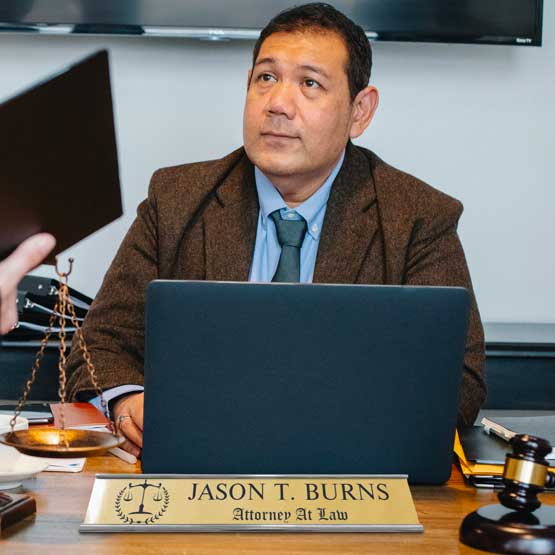 Custom Brass Name Desk Plate With Logo On Attorney's Desk.