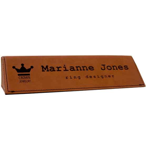 Rawhide Faux Leather Desk Wedge Laser Engraved With Sample Logo And Employee Name And Role Against White Background