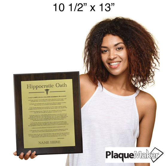Size Guide Showing A Happy Woman Holding 10 1/2 x 13 Inch Doctor's Hippocratic Oath Plaque.