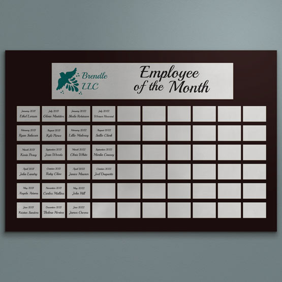 Custom Lobby Perpetual Plaque Award For Employee Of The Month With Dozens Of Silver Plates Hanging On Office Wall