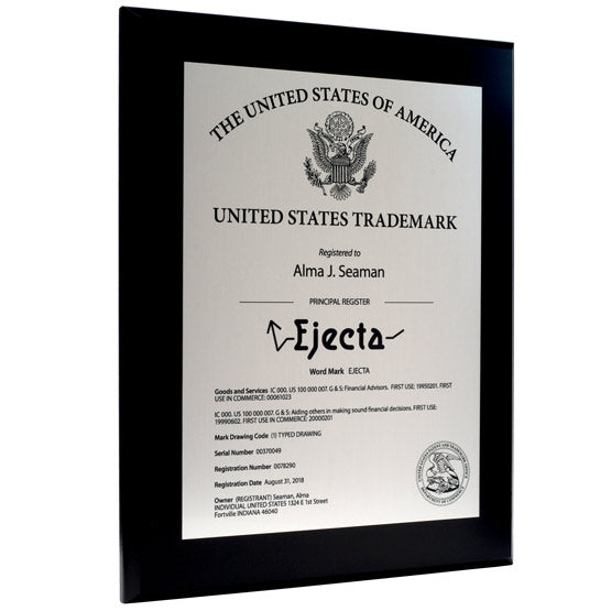 Custom Silver Aluminum Trademark Plaque With Trademark Details And Name And Registration Details On A Black Board