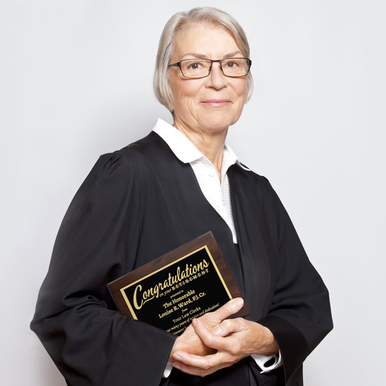 Elderly Judge Holding Custom Metal Plaque With Wood Board And Laser Engraved With Retirement Congratulations Message 