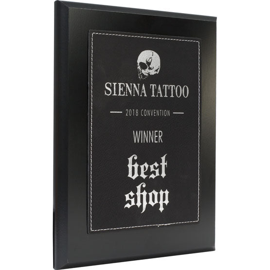 Custom Plaque With Black Faux Leather Plate Featuring Sienna Tattoo Logo And Best Shop Winner Message On A Black Board