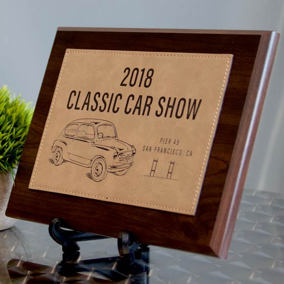 Plaque With Wood Board And Light Brown Faux Leather Plate With Classic Car Show Text And Logo Standing Via Easel On Counter