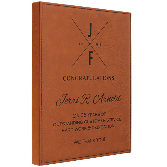 Rawhide Faux Leather Plaque Laser Engraved With Logo And Years Of Service Congratulations Message Against White Background