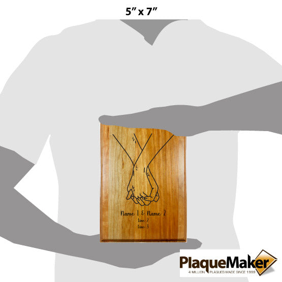 Size Guide With Blank Figure Holding Solid Cherry Plaque Engraved With Holding Hands Artwork And Showing Customizable Areas