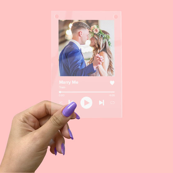 Woman Hand Holding Clear Acrylic Sign With Full Color Wedding Photo Of Couple And Spotify Style Layout With Song Details