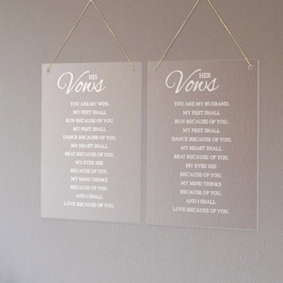 Pair Of Clear Acrylic Signs With Engraved Vows For Husband And Wife Hanging On Living Room Wall Via Holes And Twine