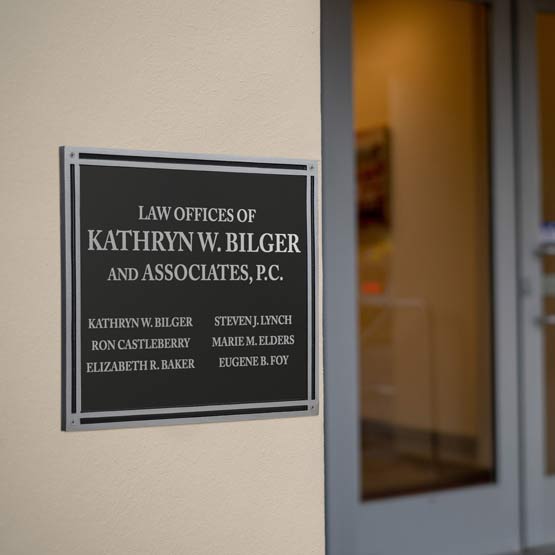Rectangle Cast Aluminum Black And Silver Sign With Plastic Plate Engraved With Law Office Details Mounted On Office Wall