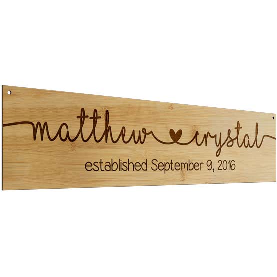Custom Rectangle Bamboo Sign Laser Engraved With Cursive Couple Names And Established Date Against White Background