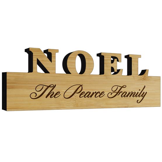 Custom Bamboo Sign With Noel Text Cutout On Rectangle Laser Engraved With The Pearce Family Text Against White Background