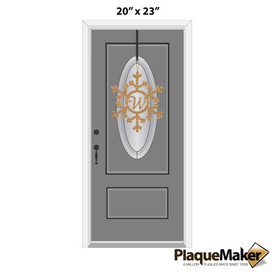 Size Guide With Snowflake Cutout Bamboo Sign With Monogram Cutout Hanging From Sample Gray Door Against White Background
