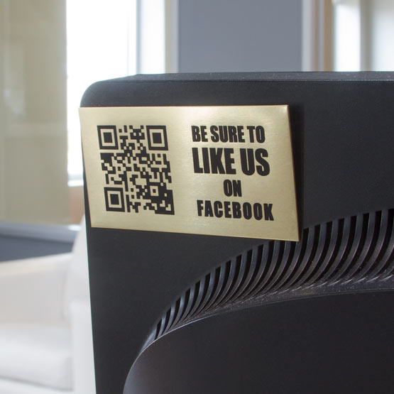 Custom Brass QR Code Tag Laser Fused With QR Code And Like Us On Facebook Message Mounted On Computer Monitor On Desk