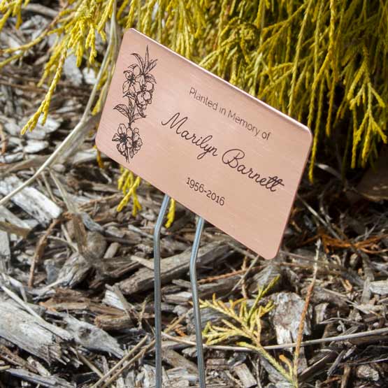 Custom Copper Garden Sign Laser Fused With Sample Memorial For Marilynn Barnett Standing In Garden Mulch Via Metal Stake