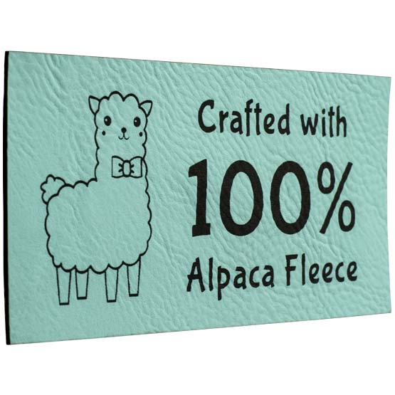 Custom Teal And Black Faux Leather Label Engraved With Alpaca Clipart And Crafted With One Hundred Percent Alpaca Fleece Text