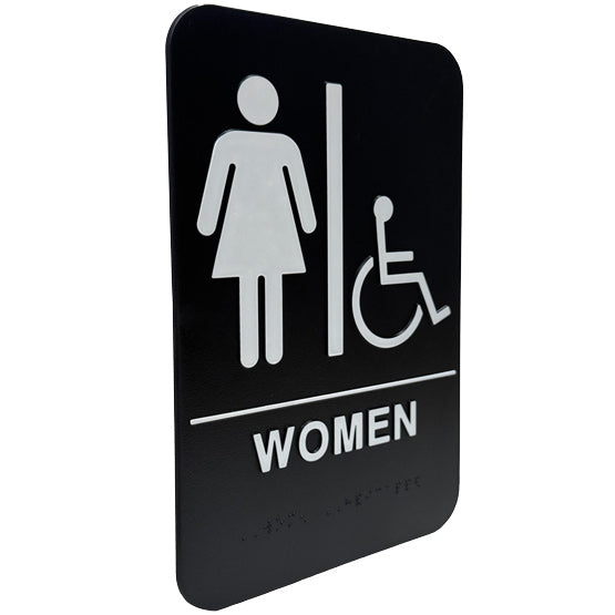 Custom Black And White Plastic Sign With Woman And Wheelchair Icons Above Women Text With Corresponding Braille