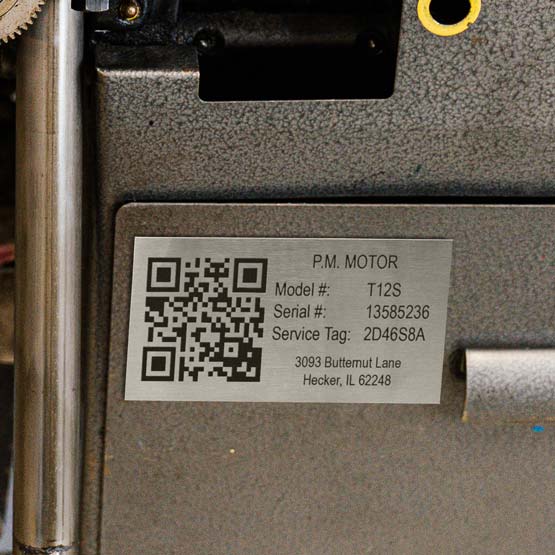 Stainless Steel Asset Tag Laser Fused With QR Code And Motor Model Details And Address Mounted Onto Silver Metal Plate